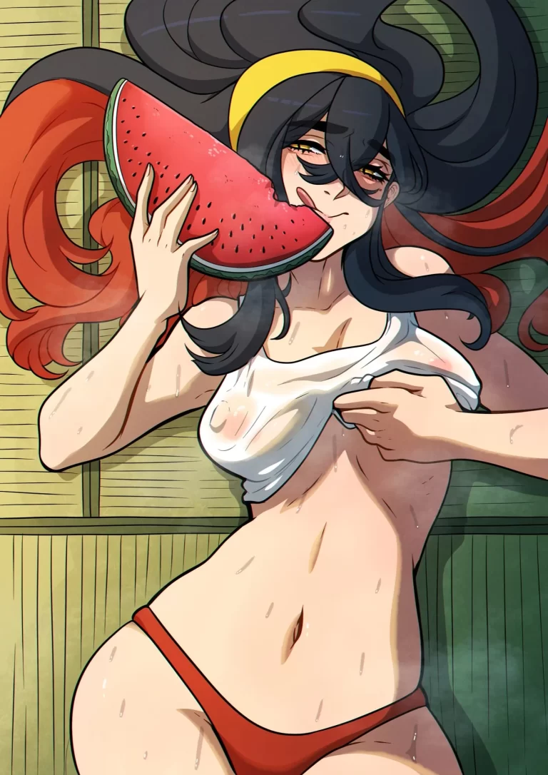 Carmine lies half naked and eats watermelon.